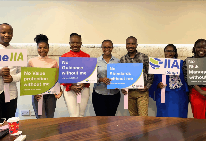 Java House internal audit team and IIA team holding placards written audit concepts | Internal Audit awareness month