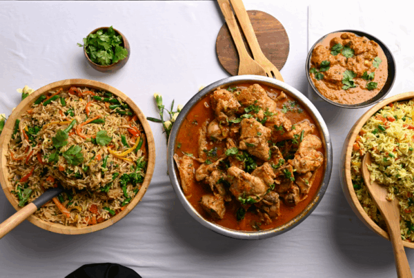 African delicacies served in bowls with wooden serving spoons | Java Group