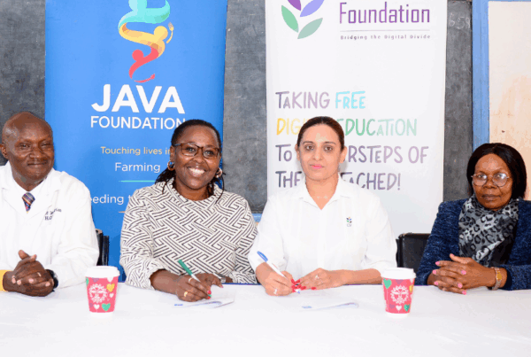 CEO Java Priscilla, and CEO Craft Silicon Foundation partnership and team all smiles signing partnership